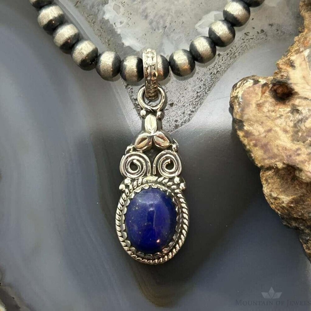 Sterling Silver Southwestern Style Oval Lapis Decorated Charm/Pendant For Women